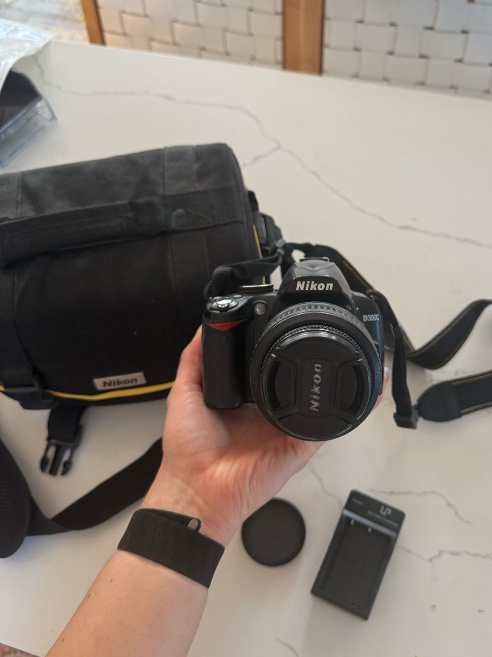 Nikon D3000 camera + lens